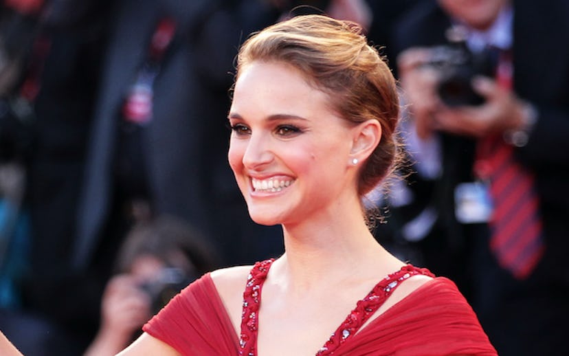 Natalie Portman posing on a red carpet
