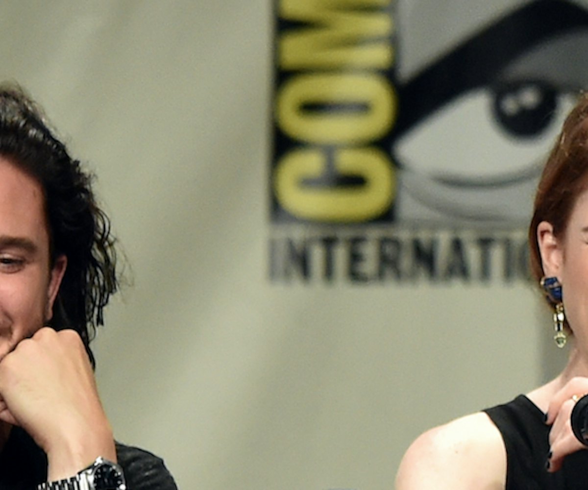 Actors Rose Leslie and Kit Harington laughing at San Diego Comic Con 