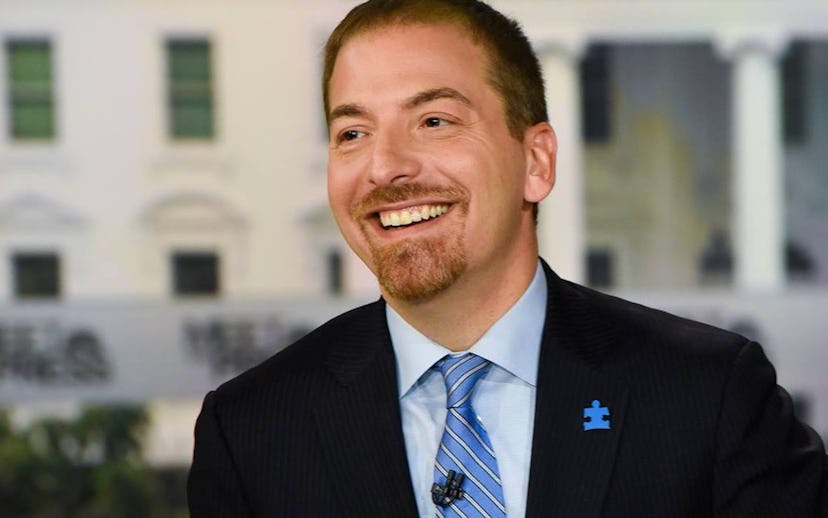 Chuck Todd dressed in a suit 