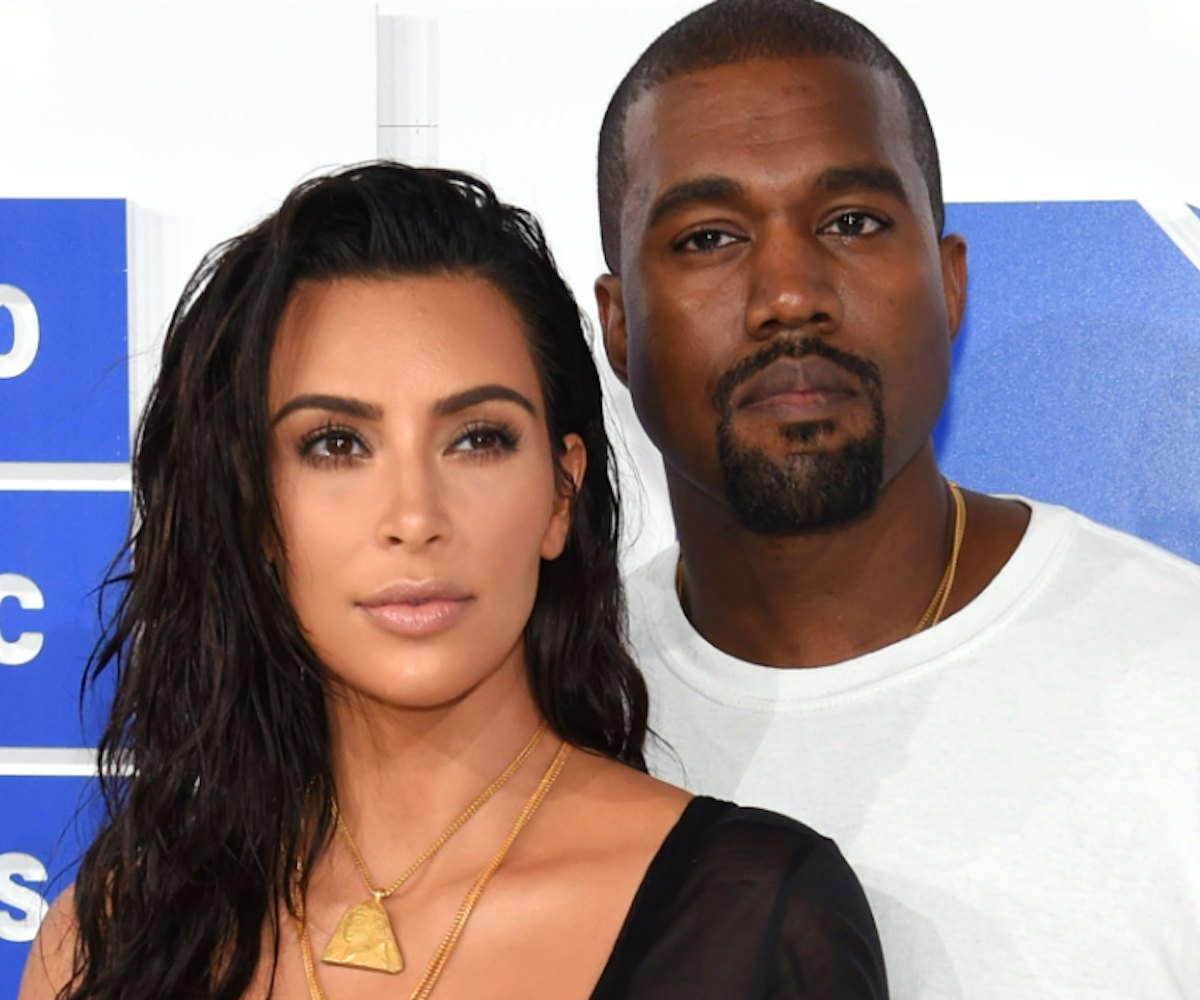 Kanye West And Kim Kardashian on an MTV event red carpet