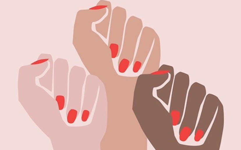 Three raised hands with clenched fists of different races symbolizing diversity