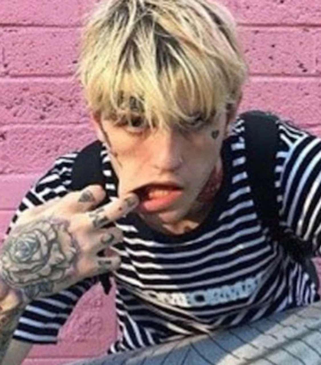 Rising Emo Rapper Lil Peep Dies At 21