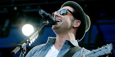 Chris Carrabba performing on stage