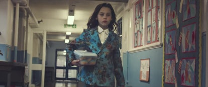 Harry Styles Continues His Reign As The King Of Suits In New Video