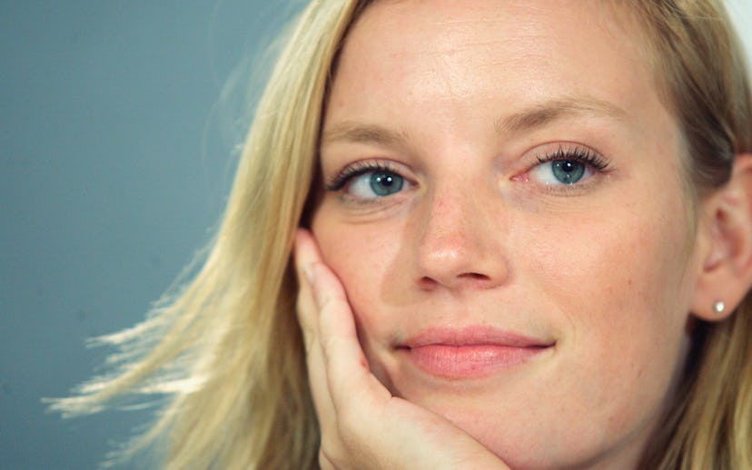 Sarah Polley posing with her hand on her cheek