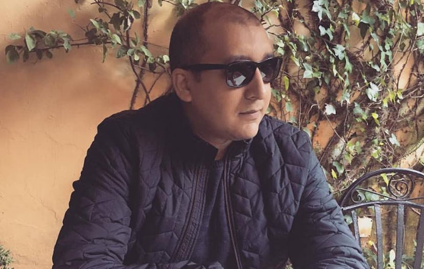 Moroccan DJ Marouane Khiyat, called MAR1, sitting while wearing a dark blue jacket and sunglasses