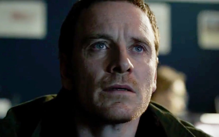 Irish actor Michael Fassbender in ‘The Snowman’ looking up