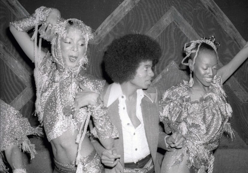Michael Jackson with two girls back in 1977