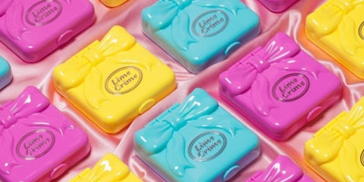 Lime Crime's Polly Pocket-inspired makeup palettes in light blue, yellow, and pink packaging