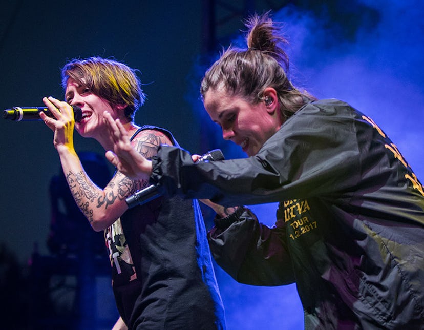 Tegan and Sara singing on stage