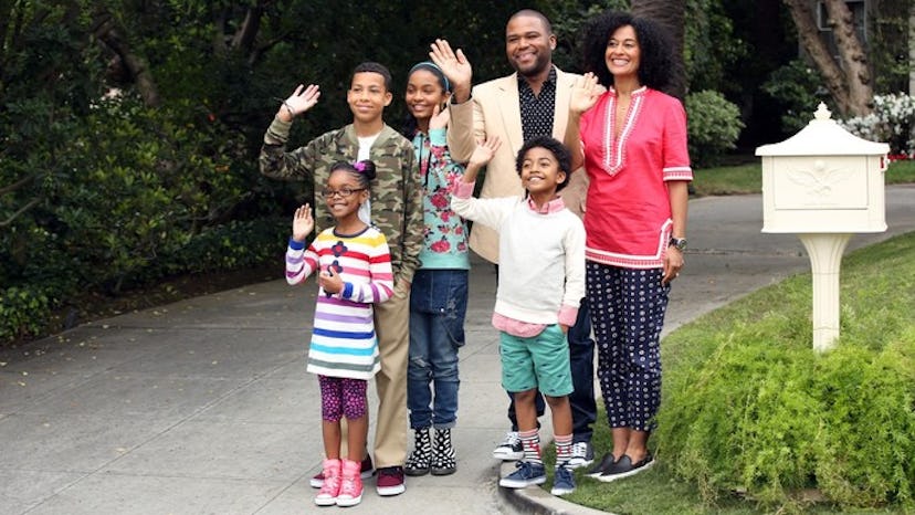 The Johnson family from Black-ish standing in their driveway, waving and smiling in the opening scen...