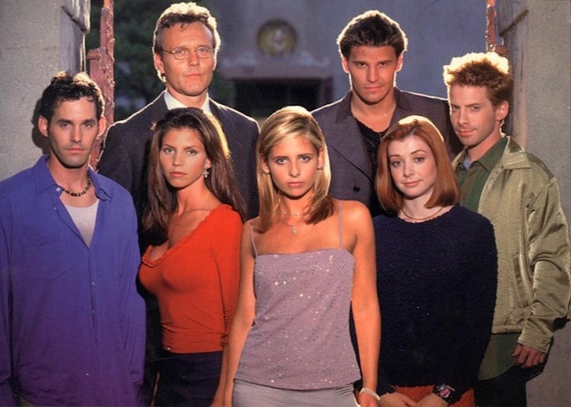 The main cast from Buffy the Vampire Slayer all looking directly at the camera while posing for a po...
