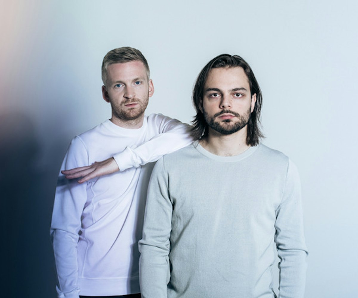 Kiasmos, a duo of techno wizards, standing next to each other in light-colored shirts