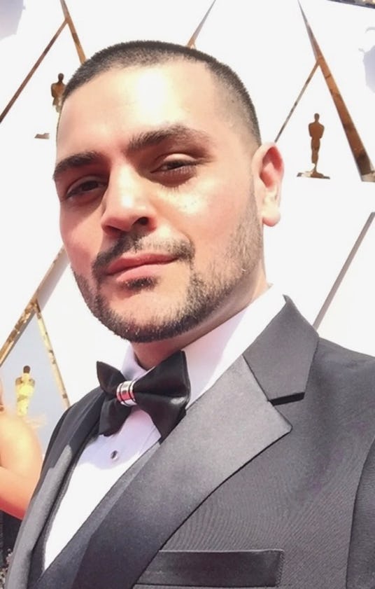 Michael Costello in a formal suit at the New York Fashion Week