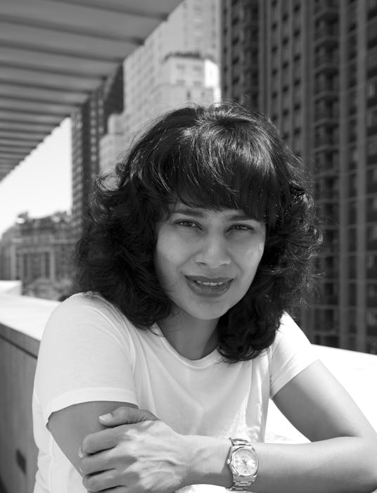 Black-white photo of Kasuni Rathnasuriya in a white shirt