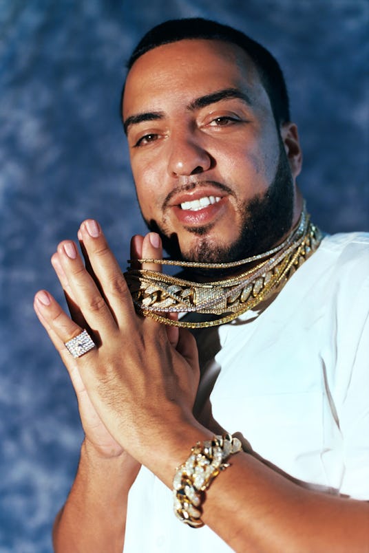 French Montana pulling his gold chains with his index fingers