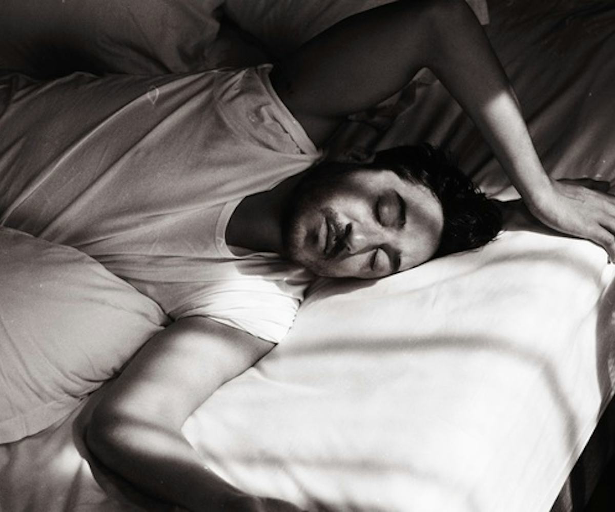 Edward Droste from the rock band "Grizzly Bear" sleeping in bed