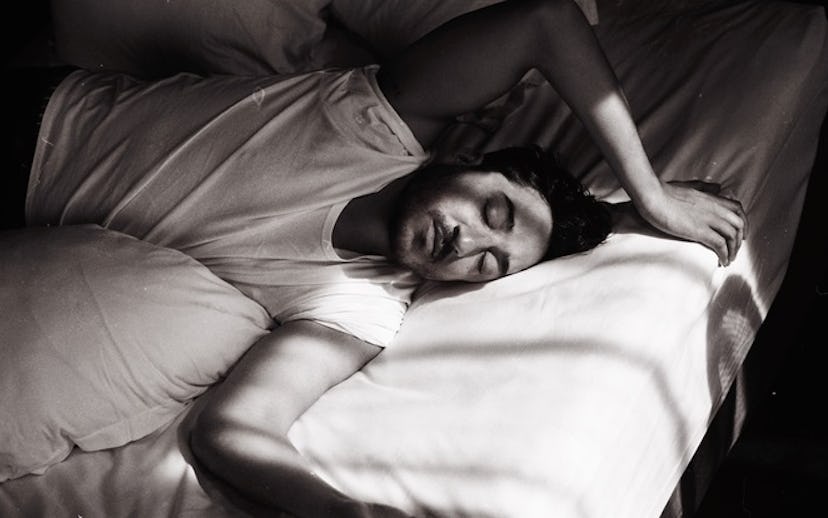 Edward Droste from the rock band "Grizzly Bear" sleeping in bed