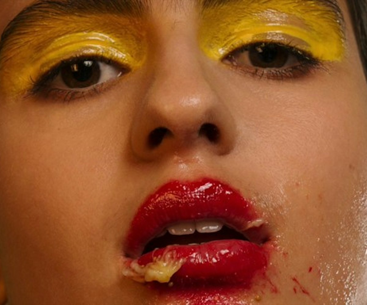 Bannoffee on the cover art for "Ripe" with yellow eyeshadow, red lip gloss and fruit smudged over he...