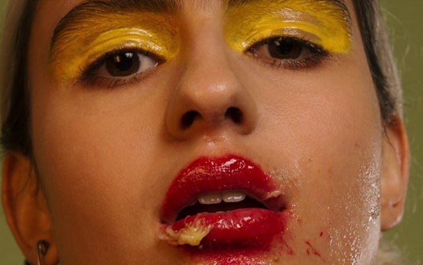 Bannoffee on the cover art for "Ripe" with yellow eyeshadow, red lip gloss, and fruit smudged over h...