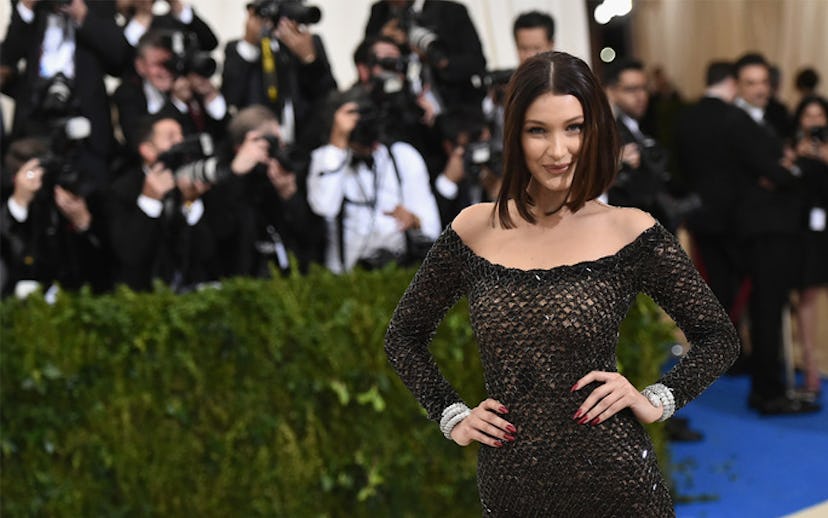 Bella Hadid on the red carpet in a sheer black dress