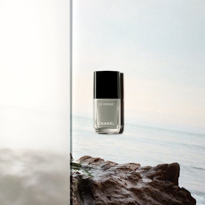 Le Vernis Longwear Nail Colour in "Horizon Line" on a sea background 