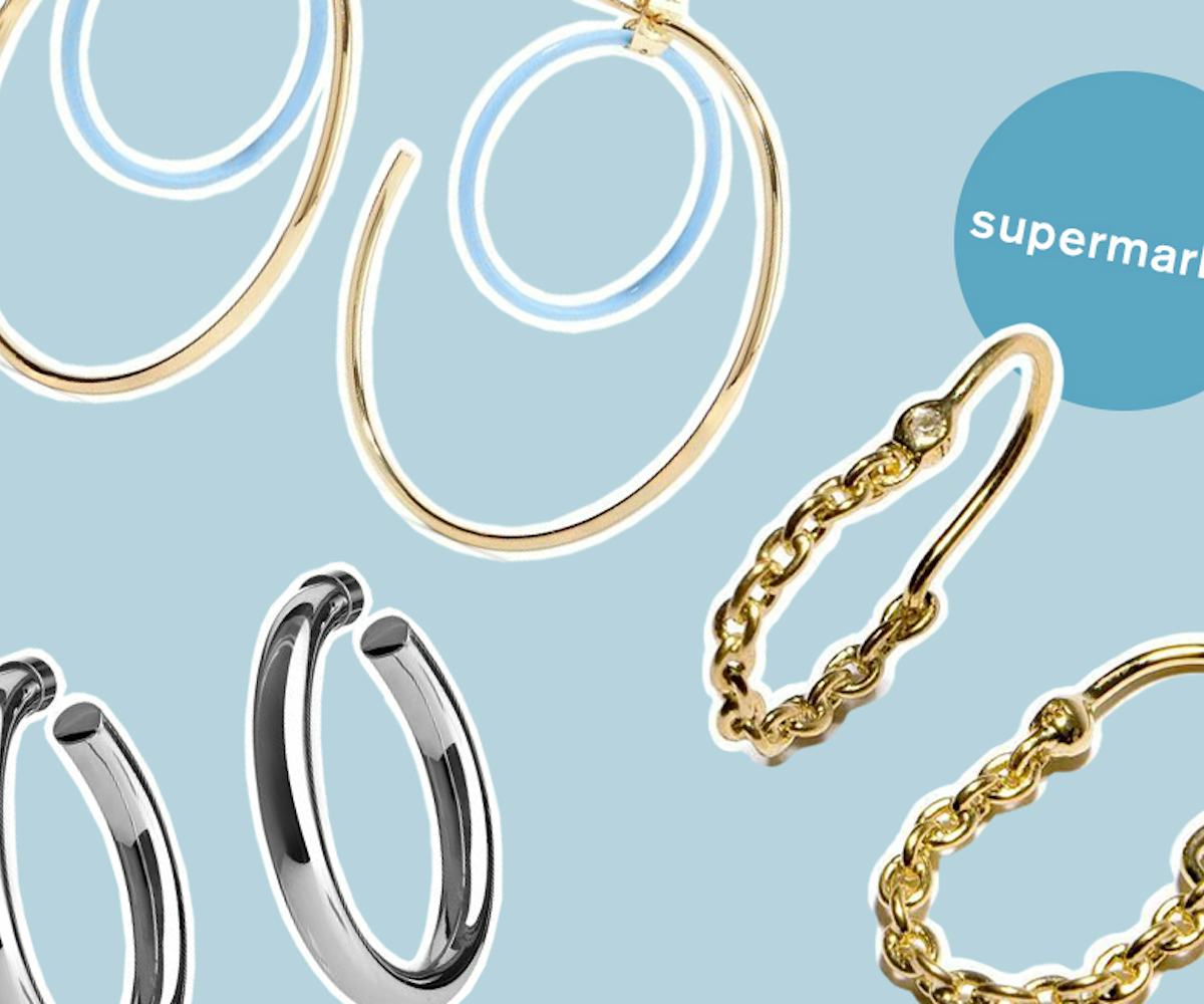 Three of the ten hoop earring pairs that people love at every price point with a light blue backgrou...