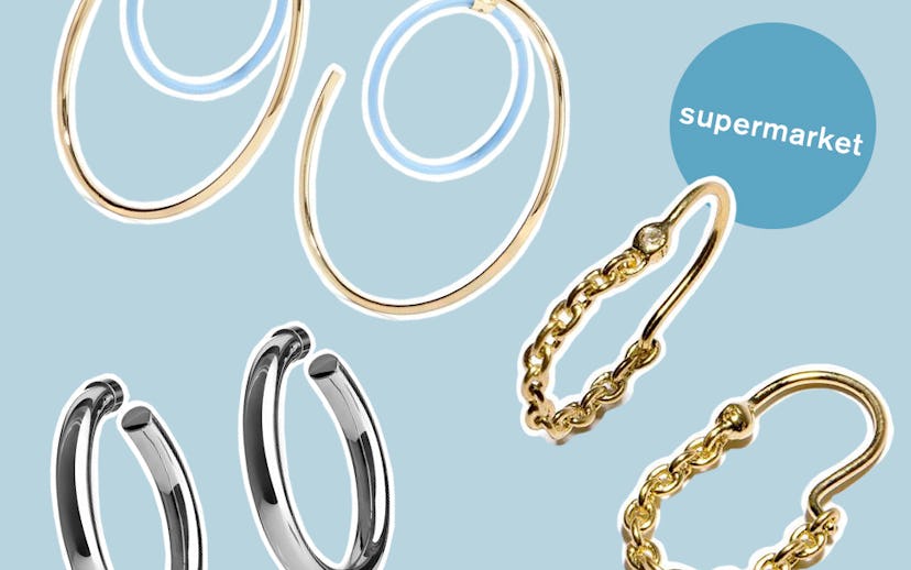 Three of the ten hoop earring pairs that people love at every price point with a light blue backgrou...