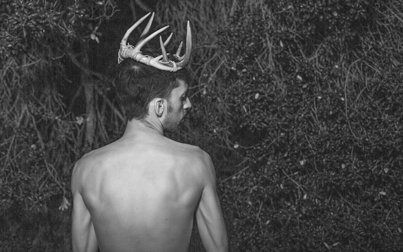 Johan wearing antlers while promoting his new single called "High in the Woods"