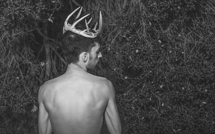 Johan wearing antlers while promoting his new single called "High in the Woods" 