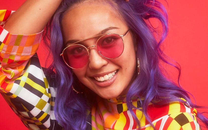 Purple-haired Gaby Borromeo smiling