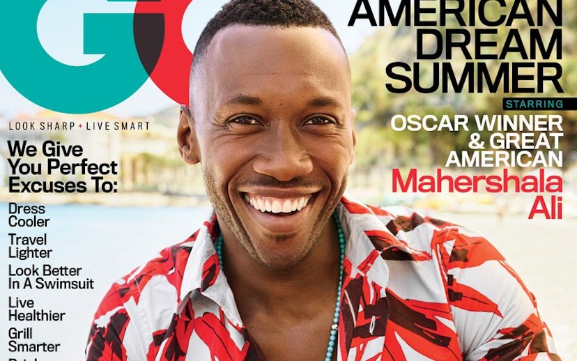 American actor Mahershala Ali on the cover of GQ in a Hawaiian white shirt with red flowers 