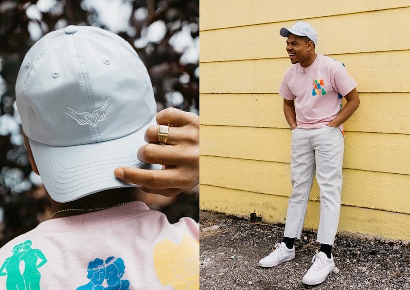 Taylor Bennett wearing  a white cap with a visual representation of two hands forming a heart on it