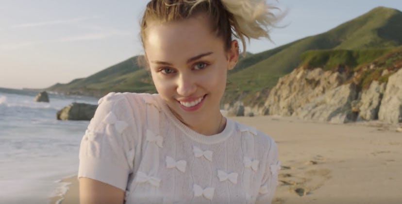 Miley Cyrus Frolics Along The Beaches Of Malibu In Her New Video