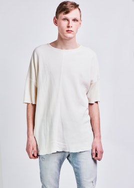A male model posing in white t-shirt