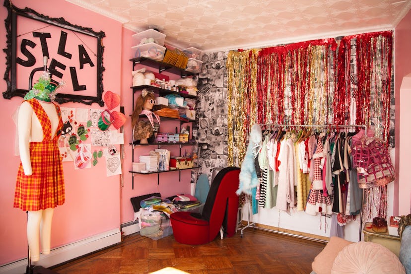 Stella Rose Saint Clair's pink room with a book case full of her decorations, prom streamers, a mann...