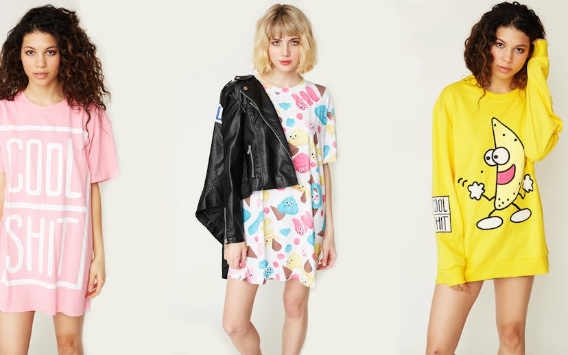 Three women posing, one in a pink cool shit tee, one in a yellow dancing banana sweatshirt, and one ...