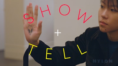 Leah Dou showing her tattoos on NYLON's "Show + Tell"