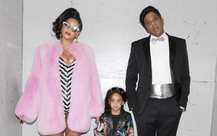 Beyoncé and Jay Z posing with their daughter Blue Ivy