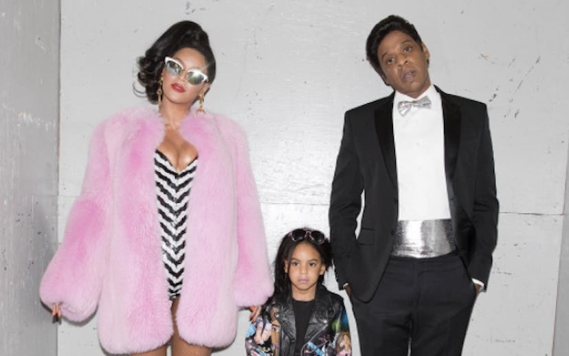 Beyoncé and Jay Z posing with their daughter Blue Ivy 
