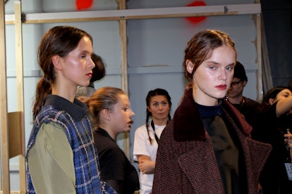 Two female models standing together at the Berlin Fashion Week