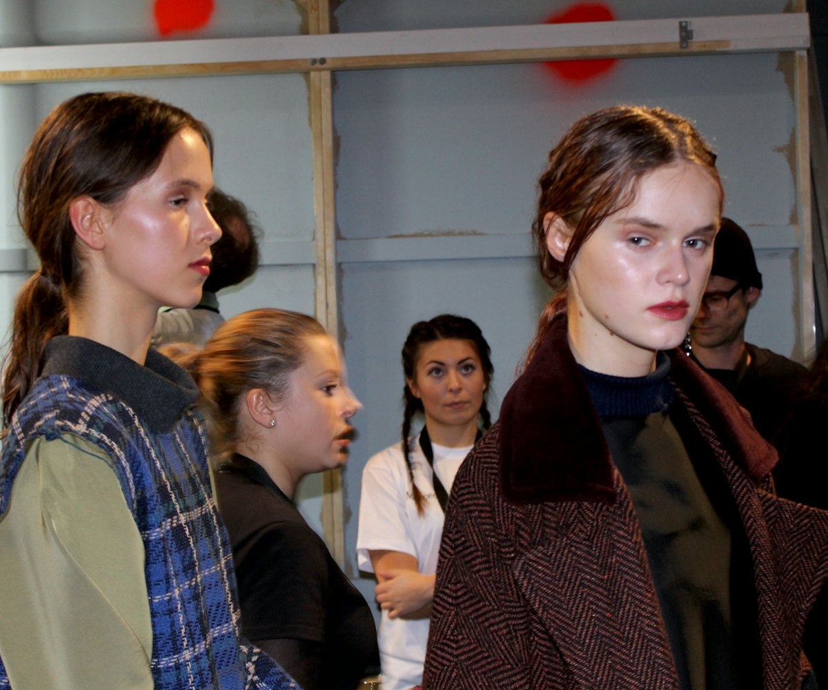 Two female models caught by paparazzi in a walk on Berlin Fashion Week