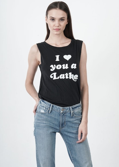 A female model posing in a black tank with a "Love You A Latke Muscle" text