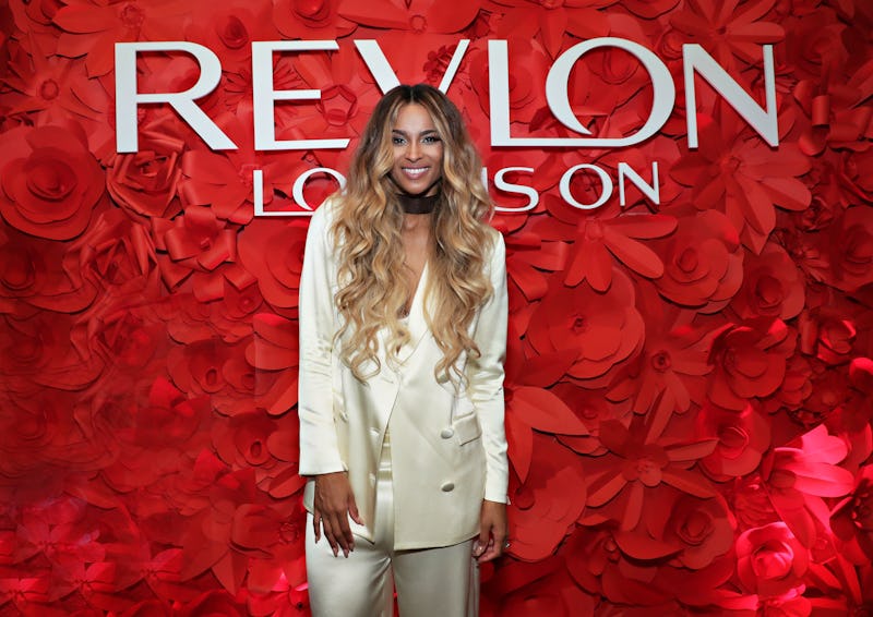 American singer Ciara in front of the "Revlon Love Is On" red rose wall