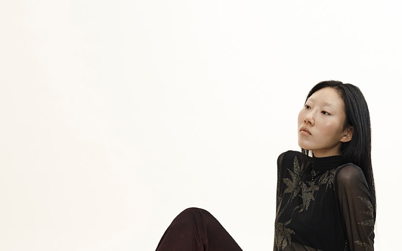 E8 uma ankle boot by MIISTA worn by a black-haired woman