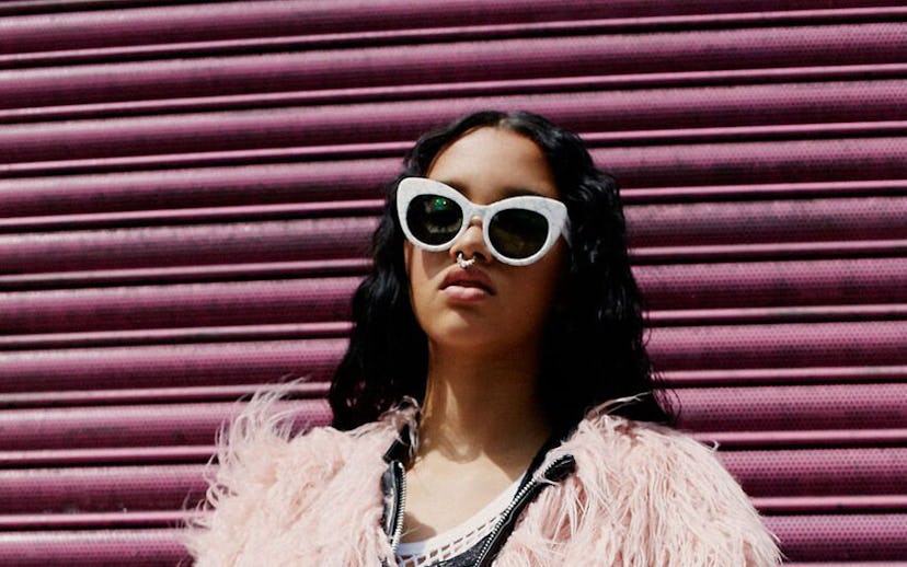 A model in Poppy Lissiman's pink fur coat