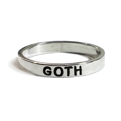 NYLONshop x Tawnie & Brina Collaboration, sliver ring with "Goth" engraved on it
