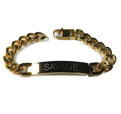 NYLONshop x Tawnie & Brina Collaboration, a gold bracelet with "Savage" engraved on it