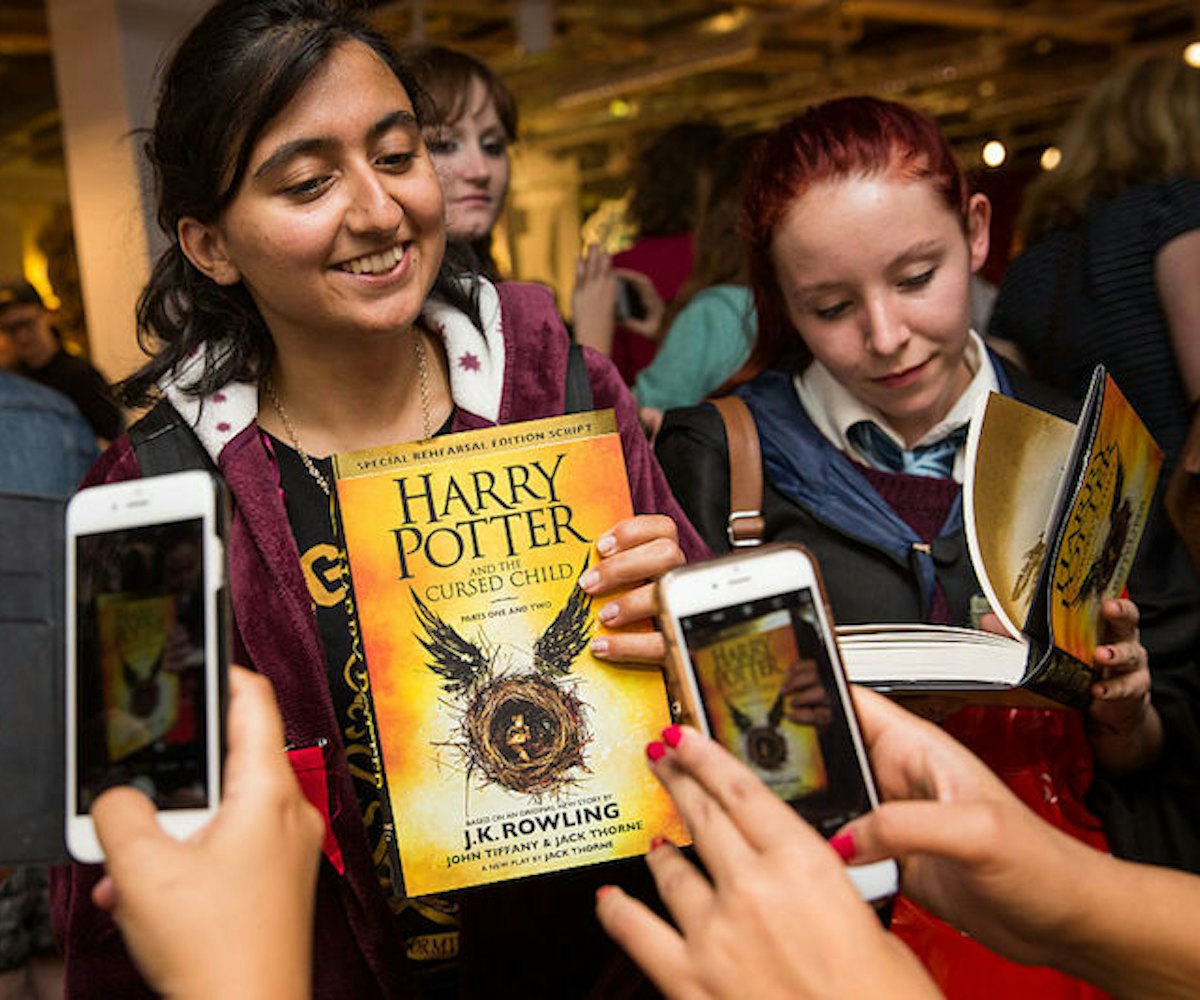 Harry Potter fans standing at the release of "Harry Potter and the Cursed Child' 