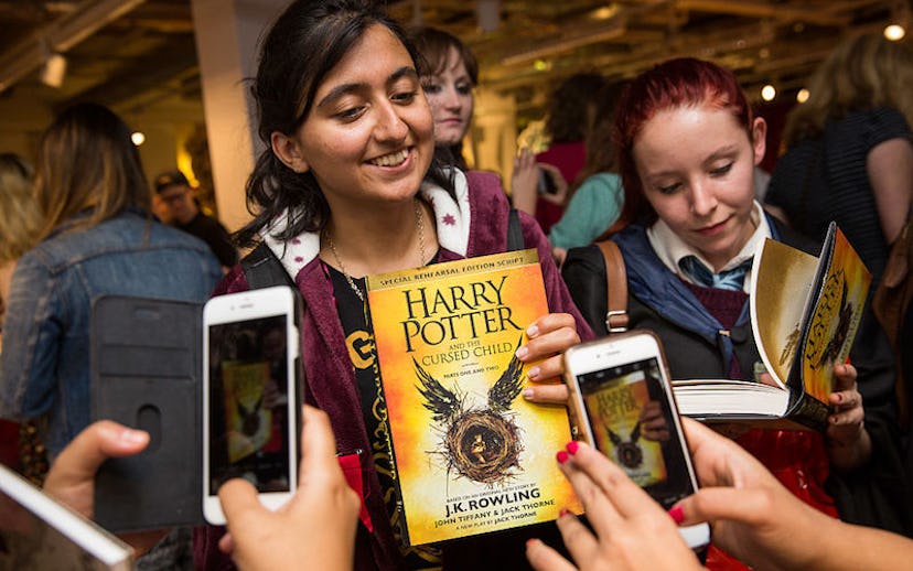 Harry Potter fans standing at the release of "Harry Potter and the Cursed Child" book